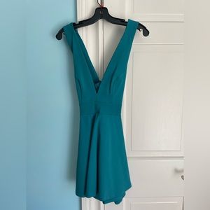 Turquoise twist in the back mini dress